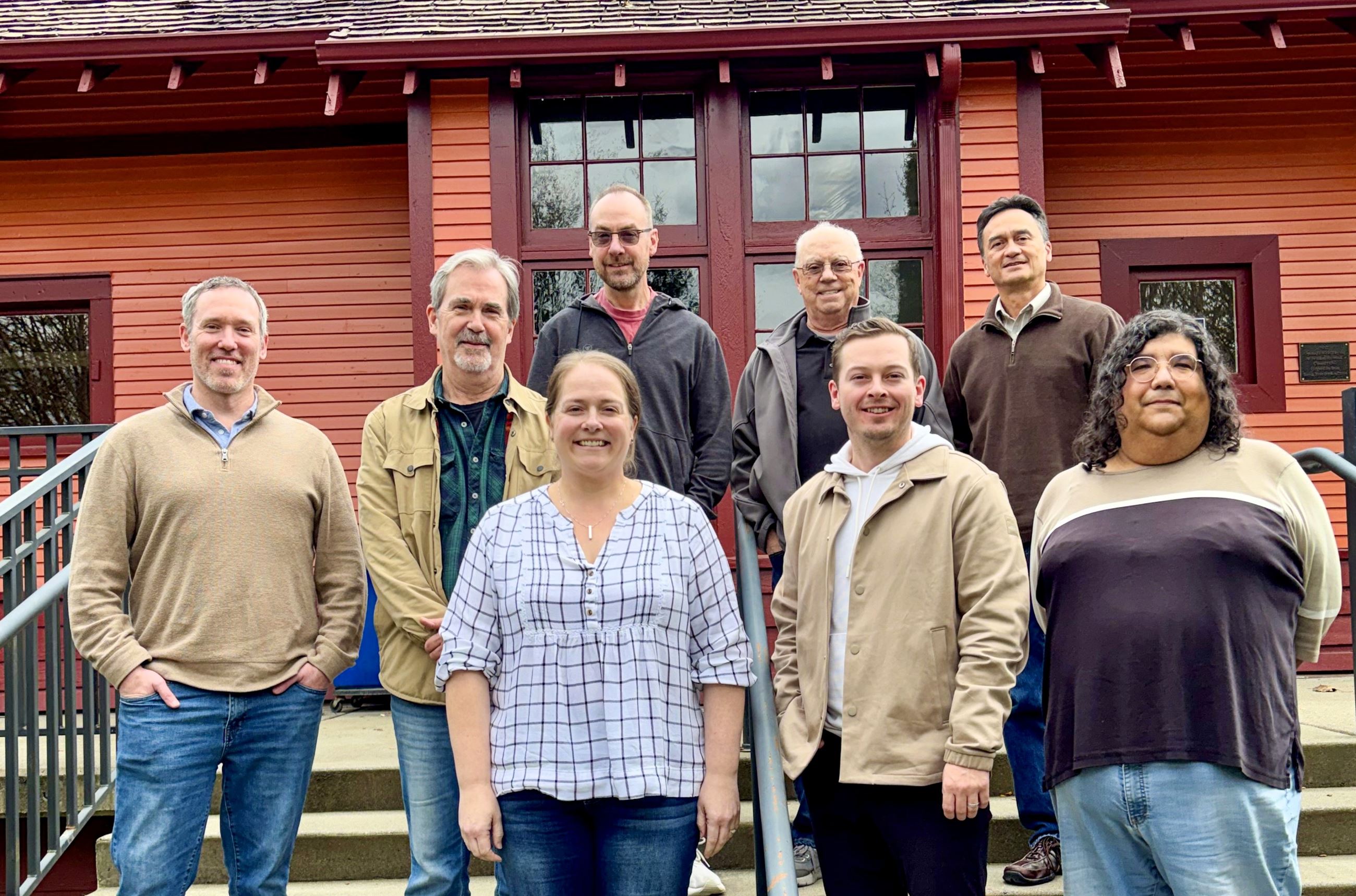 Pictures of every Duvall City Councilmember and Mayor McHenry in the backdrop of the Train Depot